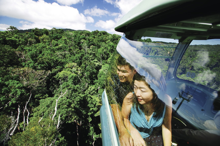 Japanese couple travelling on the Skyrail Rainforest Cableway